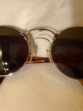 Prada Gold Frame Brown Lens Round Sunglasses
